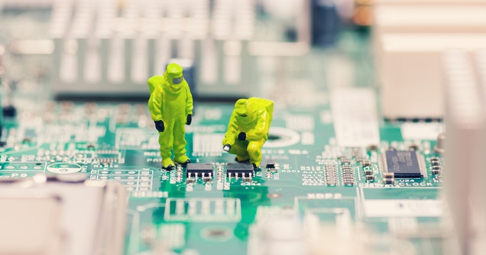 Technicians repairing circuit board
